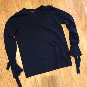 Navy sweater with fun tie sleeves